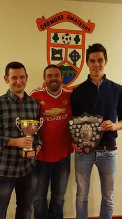 First team manager Dean Brownlee (centre), with club captain William McMurray (left) and Thomas Martin (right), who shared both the first team Players' Player of the Year and Player of the Year.
