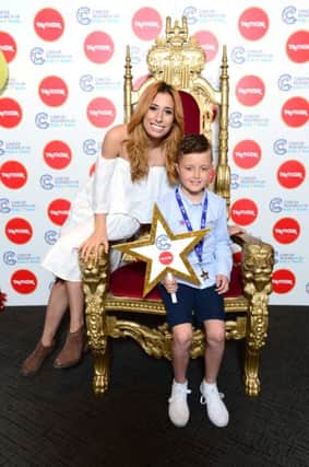 Garron Donnelly from Ballymena, meets Stacey Solomon at the Cancer Research UK Kids & Teens Star Awards party, held in partnership with TK Maxx, at The Roof Gardens, High Street Kensington, London.