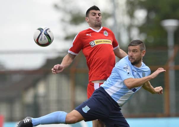 Johnny Flynn, pictured here in action for Cliftonville against Ballymena United last season, will be back in the colours of the Sky Blues in the 2016-17 campaign. Picture: Pacemaker Press.
