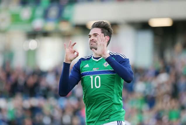 Kyle Lafferty scored on his 50th cap for Northern Ireland during their 3-0 win over Belarus on Friday night