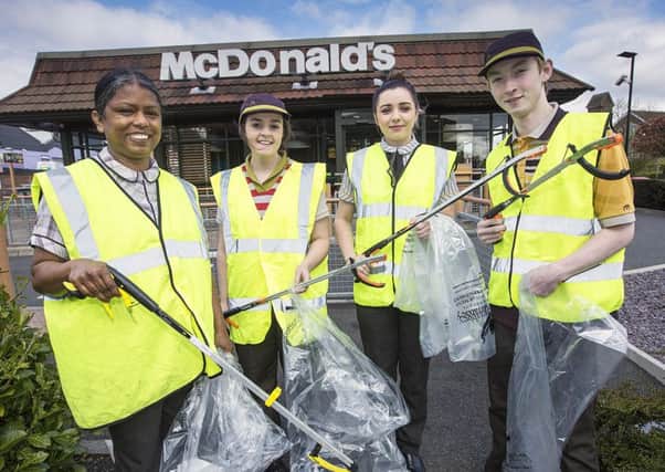 Staff from McDonald's, Glengormley, taking part in the Big Spring Clean. INNT 21-800CON