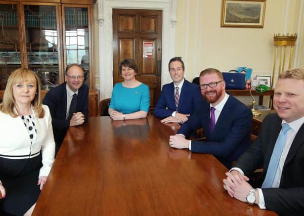 Press Eye - Belfast - Northern Ireland - 25th May 2016 - 

First Minister Arlene Foster with new Ministers Michelle McIlveen, Peter Weir, Paul Givan, Simon Hamilton and Alastair Ross at Parliament Buildings, Stormont.

Photo by Kelvin Boyes / Press Eye.