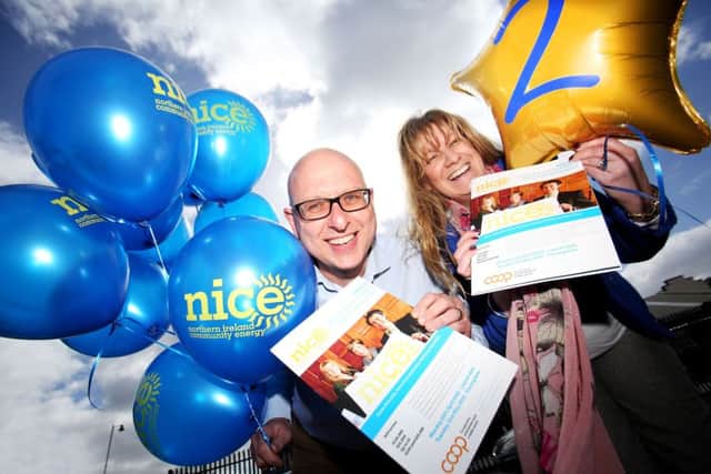 Karen Arbuckle, director of Northern Ireland Community Energy (NICE), announces the launch of a second community share offer. The project is supported by the Building Change Trust, represented by director of operations, Nigel Mc Kinney. Pic by Paul Moane / Aurora PA. INNT 20-597CON