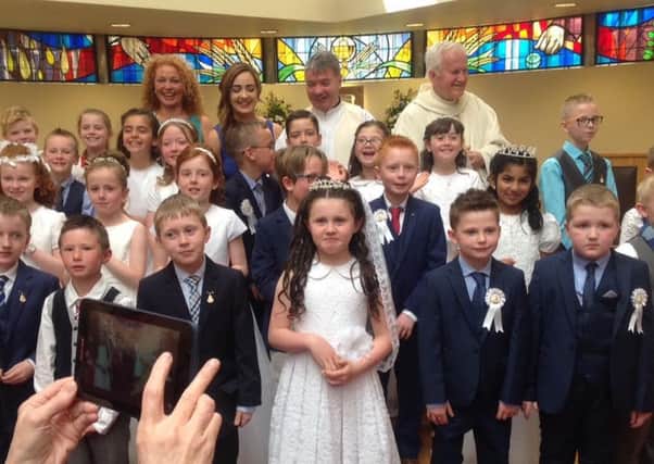 Year 4 took the next step on their faith journey at a beautiful First communion ceremony on Saturday. Many thanks to both Fr McAnerney and Fr Gates who made this such a prayerful and special occasion for everyone. The mass was enhanced by beautiful singing and music provided by the talented children of New Row, accompanied by Mrs Una McCorry. Many thanks to Miss Niamh McVey Y4 teacher for her thorough preparation of the first communicants. Thanks also to our ever-faithful Friends of New Row who along with Marie and Angela prepared and served delicious and much appreciated refreshments in the school following the ceremony.