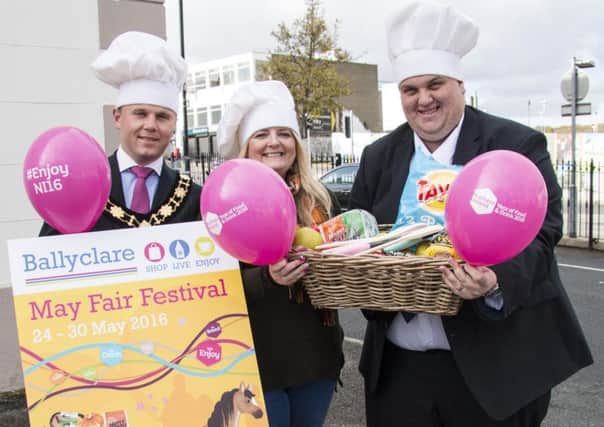 Mayor Thomas Hogg, Alderman Mandy Girvan and Cllr David Arthurs promoting the variety of Food Glorious Food-themed events on offer at this year's May Fair.