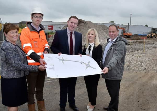 New Infrastructure minister, Chris Hazzard, centre, pictured during a visit to the new extension at Millennium Way with from left, Councillor MÃ¡rie Cairns, Philip Greaves, contractors manager, Gibson's, Catherine Seeley, MLA, and Councillor Fergal Lennon. INLM22-212.