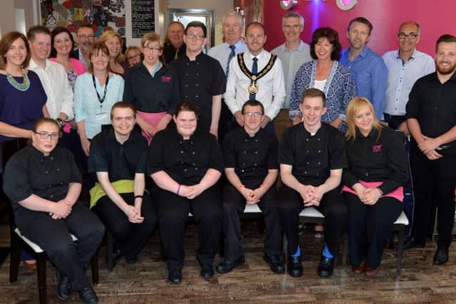Mayor of Armagh City, Banbridge and Craigavon Borough Council, Councillor Darryn Causby, centre, with staff and guests at 180 Restaurant. INPT22-205.
