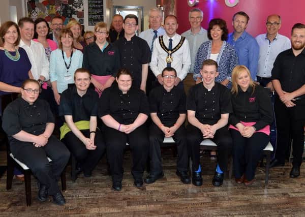 Mayor of Armagh City, Banbridge and Craigavon Borough Council, Councillor Darryn Causby, centre, with staff and guests at 180 Restaurant. INPT22-205.