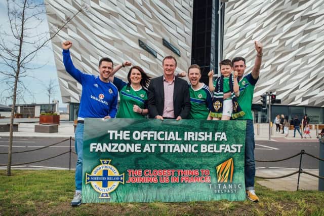 Northern Ireland manager Michael ONeill with Cool FMs Pete Snodden and other Northern Ireland fans at Titanic Belfast, set to host the official Euros Fanzone this June.