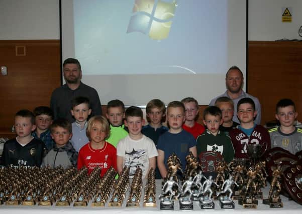 Under 8 players who attended the Northend United Youth FC awards evening in the Michelin Athletic Club with coaches George Patterson and Davy McClintock . INBT 22-179CS