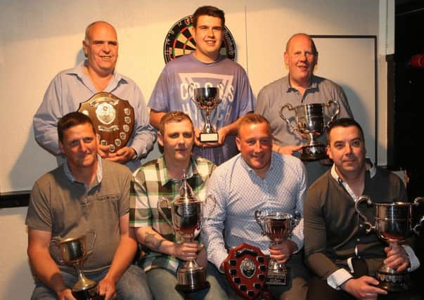 Drifters who were overladen with trophies at the Ballymena, Harryville & District Darts League dinner in the Coach Bar. Back row, L-R, John Elder, Darnel McCrory, Geoff Wylie. Front, L-R, Andy Martin, Geoffrey Matthews, Jeff McIlveen and Stephen McIlroy. INBT 22-186CS