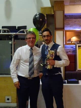 First Team Manager Errol Curran presents Damien Higgins with the Player of the Year award