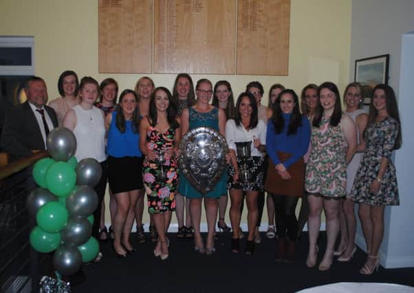 Randalstown First XI members pictured with the Ulster Shield and President's Cup after a successful season.