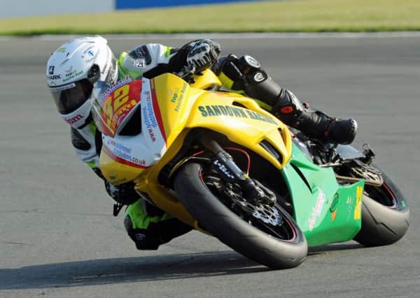Carl Phillips in action at Donington Park. Photo by Alan Heal.