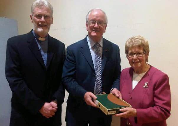 Kenneth Twyble pictured in 2013 before his appointment as lay leader. He was presented with a Wesley Study Bible by the Rev Dr David Clements, superintendent of the Portadown Methodist Circuit, and Mrs Myrtle Wright, circuit steward. INPT22-030