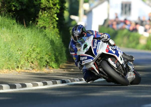 Ian Hutchinson on the Tyco BMW Superbike at Gorse Lea during practice for the Isle of Man TT on Monday evening.