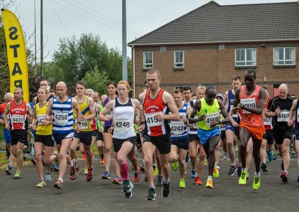 Runners toe the line at the annual May Fair 10k race in Ballyclare, organised by East Antrim Harriers. INLT 22-919-CON