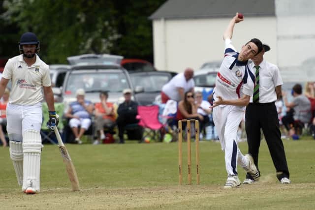 Newbuildings bowler Trent McKeegan pictured in action against Donemana at The Holm. INLS2316-101KM