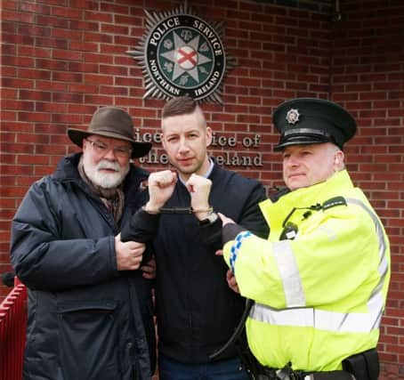 Davy Boyle (The Caring Caretaker) and Constable Ricky Black apprehend magician Rod Hogg. INCR7-321PL
