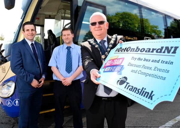 Councillor Billy Ashe, Mayor, Mid and East Antrim Borough Council is joined by John Morgan and Chris McCrory, Translink as they help launch Translink's first ever Bus and Train Week. (Submitted Picture).