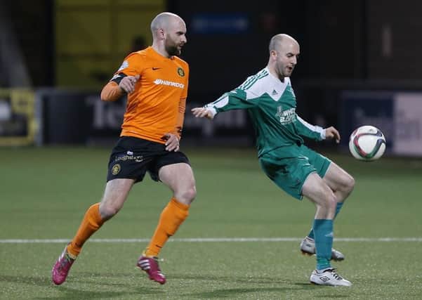 Ryan Kane (left) seen here in action for Carrick Rangers against Crumlin Star. INLT 23-901-CON