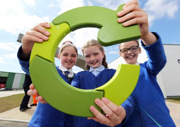 Chapel Road PS pupils Abigail Wright, Hannah Craig and Emily Clifford, pictured at the official opening of the new Recycling Centre at Pennyburn on Tuesday.    Photo: Lorcan Doherty