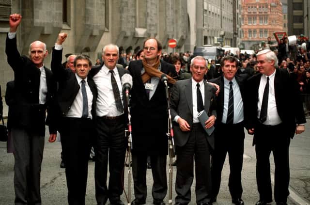 File photo dated 14/03/91 of the Birmingham Six (left-right) John Walker, Paddy Hill, Hugh Callaghan, Chris Mullen MP, Richard McIlkenny, Gerry Hunter and William Power outside the Old Bailey in London after their convictions were quashed, as the sister of a Birmingham pub bombings victim has said a decision to grant an inquest in the case would be "seismic". PRESS ASSOCIATION Photo. Issue date: Wednesday February 10, 2016. Julie Hambleton, whose 18-year-old sister Maxine was killed in the 1974 attacks, said the hearing by a coroner of an application to resume the inquest was "momentous" for the families. See PA story INQUEST Birmingham. Photo credit should read: Sean Dempsey/PA Wire