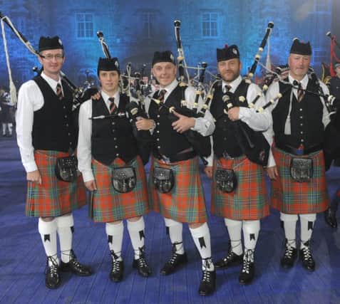Pipe Major Alyson McKnight and some members of Thiepval Memorial Pipe Band pictured at the Belfast Tattoo 2015.