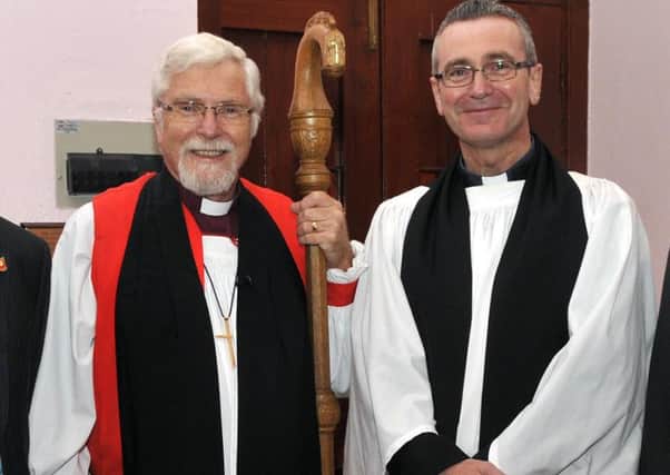 The Right Reverend Harold Miller, Bishop of Down and Dromore with Rev Alan Kilpatrick at his installation as rector of Knocknamuckley Parish Church