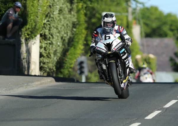 Michael Dunlop on the Hawk Racing BMW at Ballagarey during practice for the Isle of Man TT on Wednesday evening.