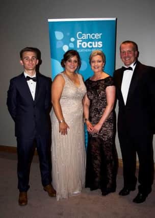 Nathan Hutchinson and his auntie, Tracy Johnson, are pictured alongside Ann Goggins and Robin Kennedy during their recent black tie fundraiser.