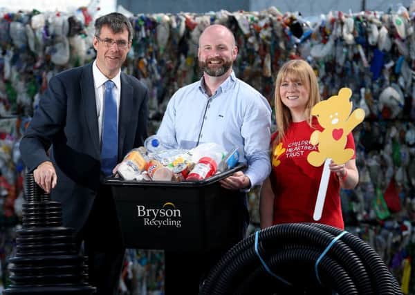 Eric Randall from Bryson Recycling, Kris McClelland from Cherry Pipes and Lynn Cowan from Childrens Heartbeat Trust, come together to encourage more than 170,000 households to recycle more for a good cause. For every tonne of recycled goods, partners will donate Â£1 to the nominated charity throughout the campaign.