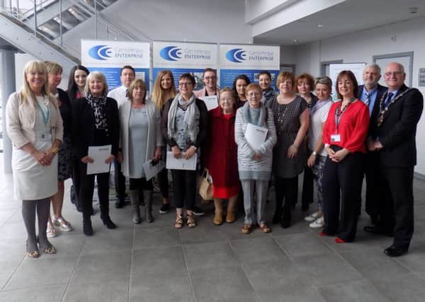 The Mayor of Mid and East Antrim Borough, Councillor Billy Ashe was at Carrickfergus Enterprise to mark completion of Ambassador WorldHost Training for Coastal Hub participants, included are Kelli Bagchus and Bill Adamson, Carrickfergus Enterprise and Karen McLeod and Jackie Smyth, Northern Regional College. INCT 23-703-CON