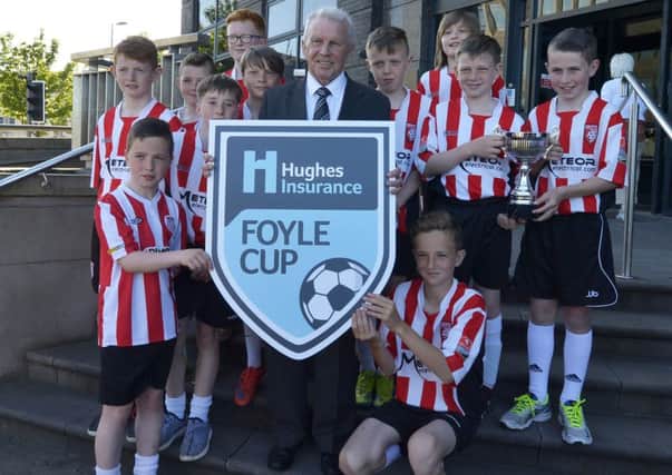 Former Republic of Ireland international and TV pundit John Giles with Derry City Colts players launching the 2016 Foyle Cup at the City Hotel.