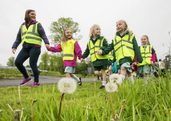 Pupils from Gracehill Primary School in Ballymena enjoyed a carnival-themed walk to school as part of the Department for Infrastructures Travelwise NIs Walk to School Week celebrations. Photo Credit: Brian Morrison