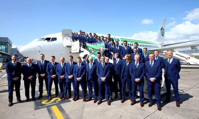 Members of the Northern Ireland football team and staff, including chef Brian Donaldson, join Manager Michael ONeill and captain Steven Davis as they leave Northern Ireland from George Best Belfast City Airport. Photo by William Cherry