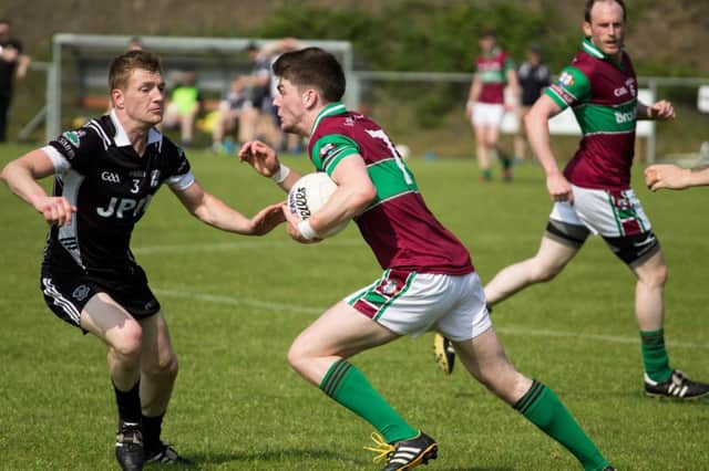 Action from Eoghan Rua's win over Dungiven. Picture: Davy McDonald