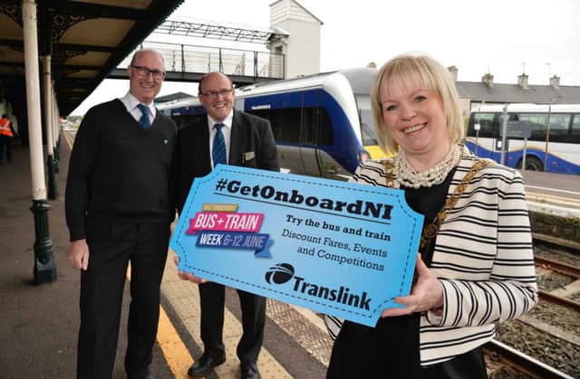 Just the ticket: Councillor Michelle Knight-McQuillan, Mayor, Causeway Coast and Glens Borough Council is joined by Austin Millar and David Simpson, Translink as they help launch Translink's first ever Bus and Train Week.