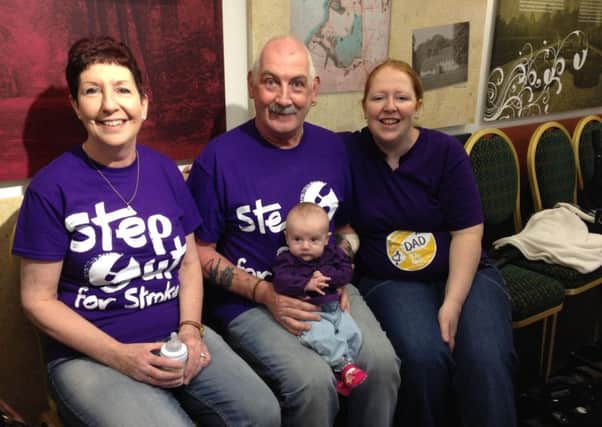 Bert Foster (centre) pictured at the Step out for Stroke walk with his wife Sarah, daughter Justine and grand daughter Mya. INNT 23-803CON