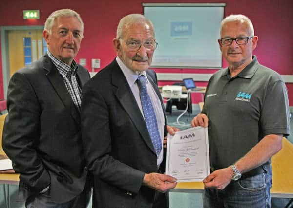 David being presented with his Advanced Driving Test Certificate.
Included:  Robert Boyd, Chairman, Ballymena Advanced Motorists and Charlie Law, Staff Examiner, IAM (Northern Ireland).