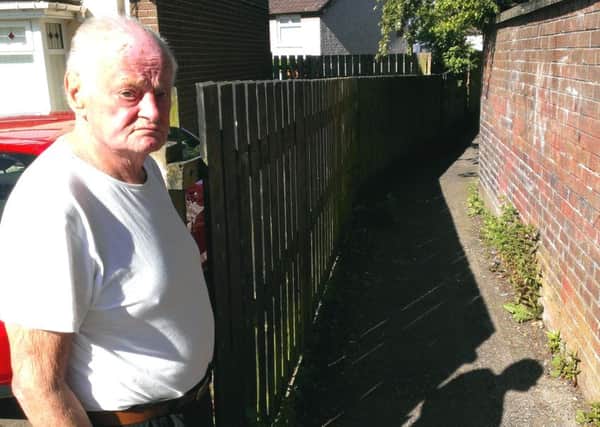 Harry Taylor pictured at the alleyway between Carmeen Drive and Derrycoole Way. INNT 23-500CON