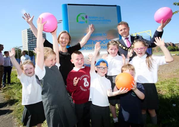 Outgoing Mayor Thomas Hogg performed the official opening of the new Multi-Use Games Area in the Rathcoole estate. He was joined at the event by Mrs Quinn and pupils from Rathcoole Primary School.