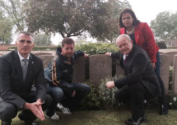 Declan Kearney (left) pictured with Conor Heaney, Special Advisor to Martin McGuinness, Mary Lou McDonald and Martin McGuinness.
They are pictured at the graveside of Conor's great grandfather Patrick Heaney, Royal Irish Fusiliers. INNT 23-805CON