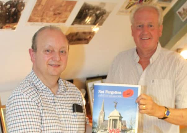 Richard Edgar and Clive Higginson with their book 'Not Forgotten: Lurgan and the Great War'.