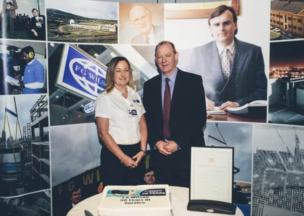 Ann Brown, FG Wilson, and Robert Kennedy, Caterpillar NI, are pictured at the event in Larne marking 50 years of FG Wilson.  INLT 25-651-CON