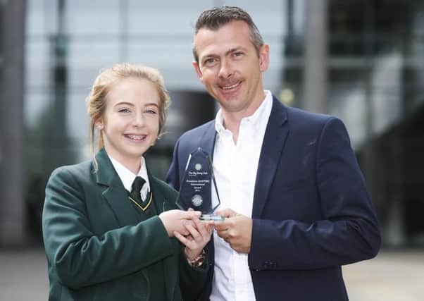 Clara Deehan, who won a Young Innovator of the Year at the Sentinus Award, with her dad Mark. She's Tommy Conlon's granddaughter