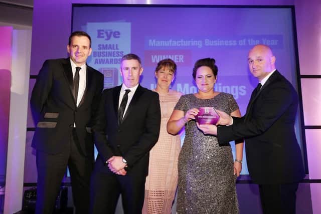 Warren Hanley, Jacqui Gray, Joanne Liddle and James Williamson, from IPC Mouldings in Carrick, which took the Manufacturing Business of the Year title. It was presented by Gerry May from category sponsors Forde May Consulting. INCT 24-701-CON