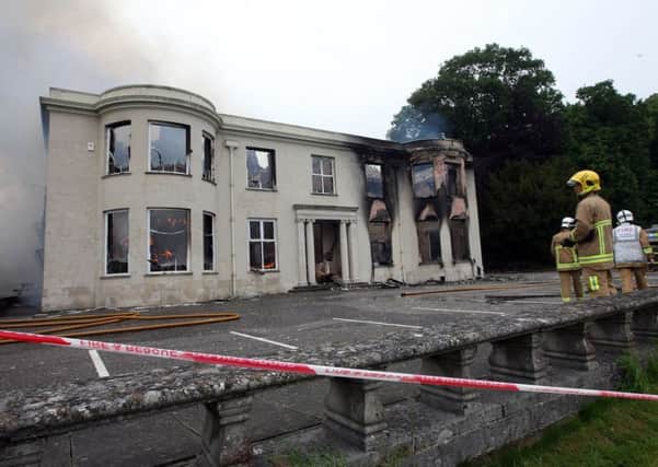 Firefighers battle the blaze at Lissue House on Lisburn's Ballinderry Road. Picture: Freddie Parkinson/Presseye
