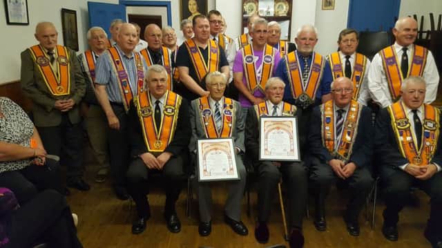 Members of Killycoogan ILOL No.48 and guests with the 70 years jewels and certificates recipients. (Submitted Picture).