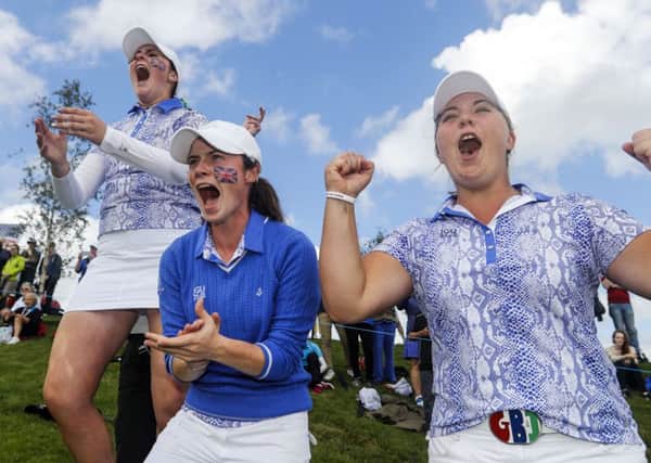 Great Britain and Irelands Olivia Mehaffey, Alice Hewson and Leona Maguire celebrate winning the Curtis Cup